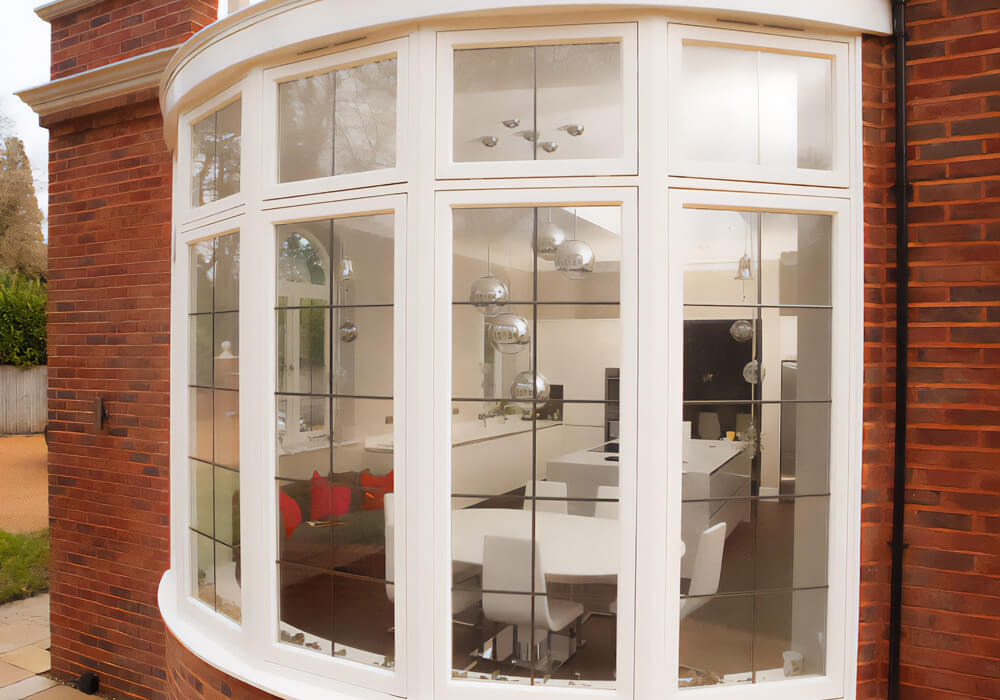 Bespoke bay window looking into kitchen and dining area