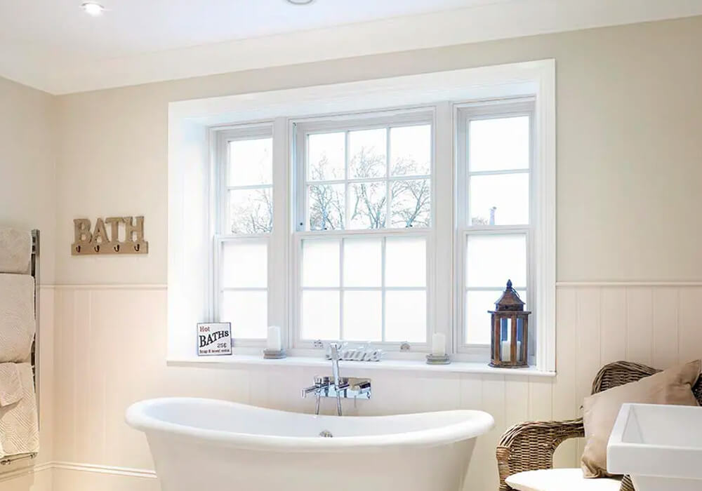 Bathroom with white sliding sash windows