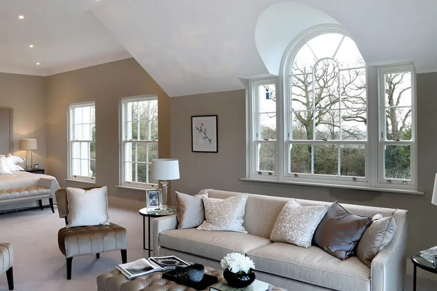 Big bedroom with white sliding sash windows