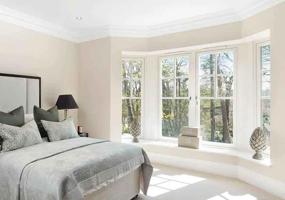 Bedroom with lipped casement windows