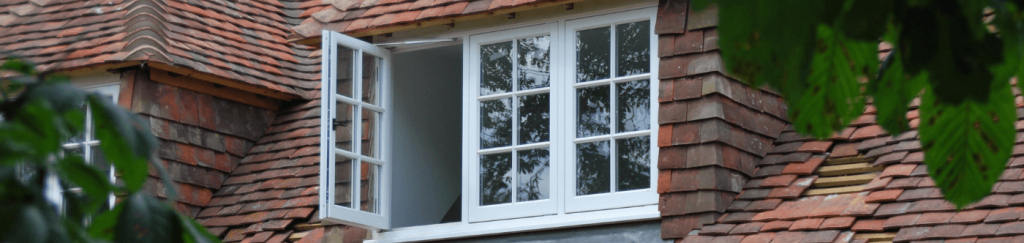 external image of second story of flush timber casement windows, one window is open